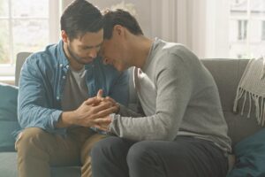 two men mourn another loss in the lgbtq community due to addiction