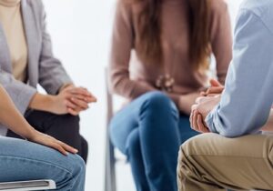a therapy group in a polysubstance abuse treatment program meets for a session 